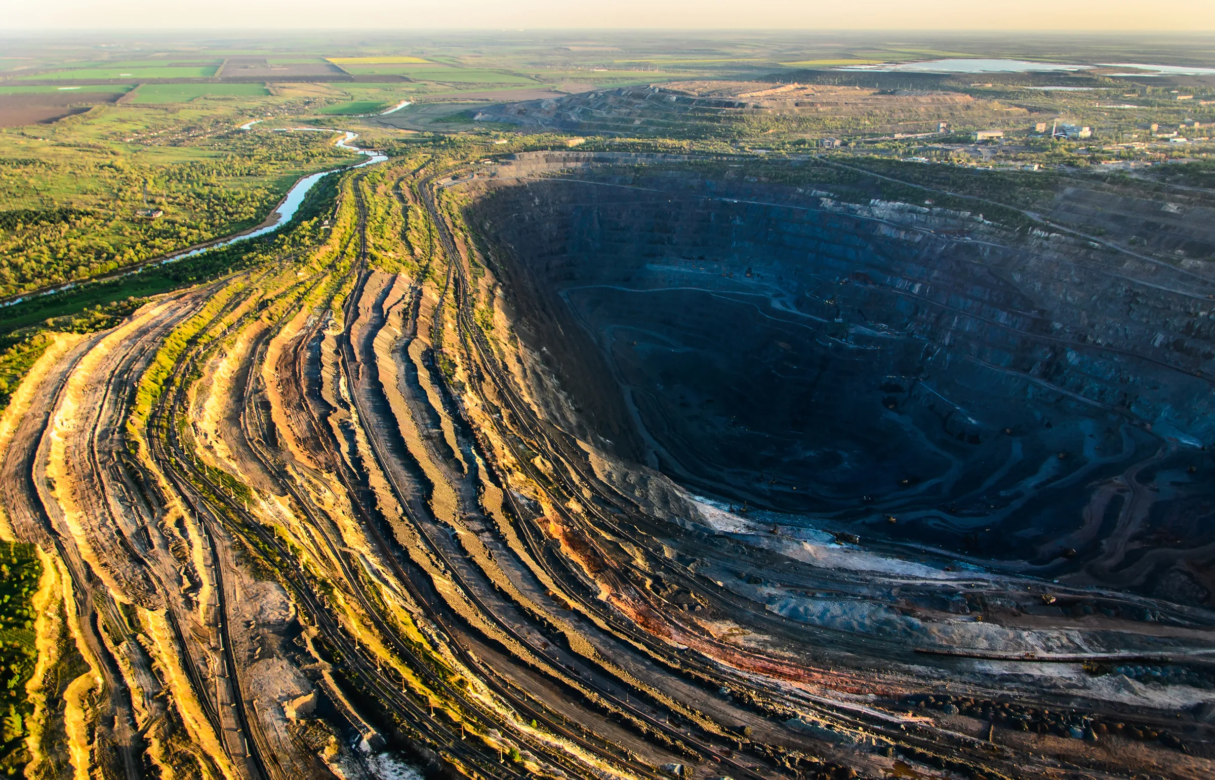 Aerial view of the open-pit mine and the Inhulets River in Kryvorizhzhia