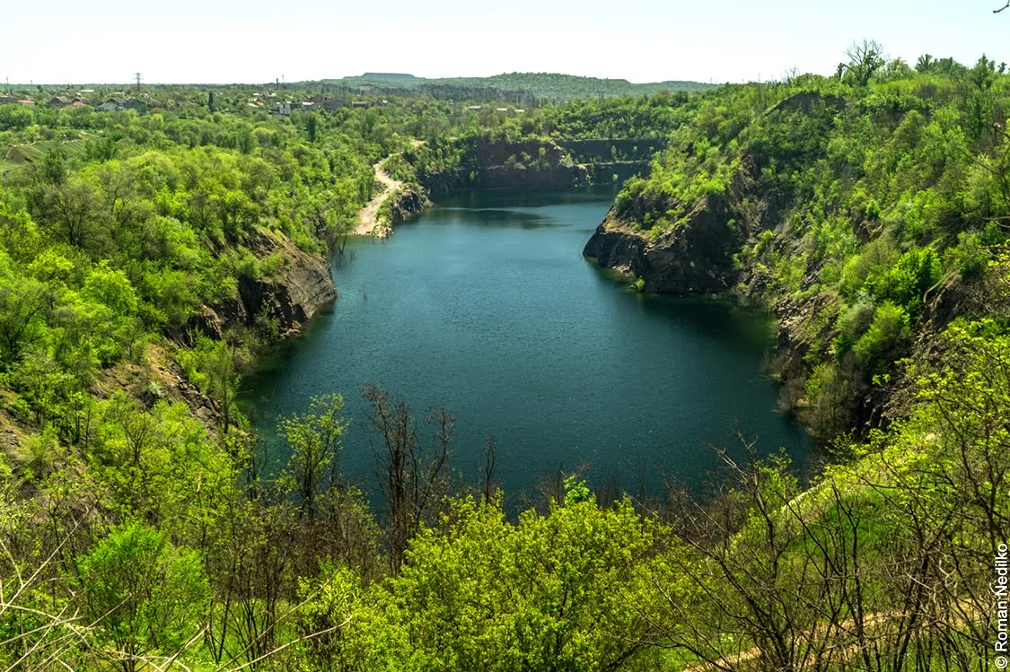 Flooded quarry and green landscape in Kryvorizhzhia