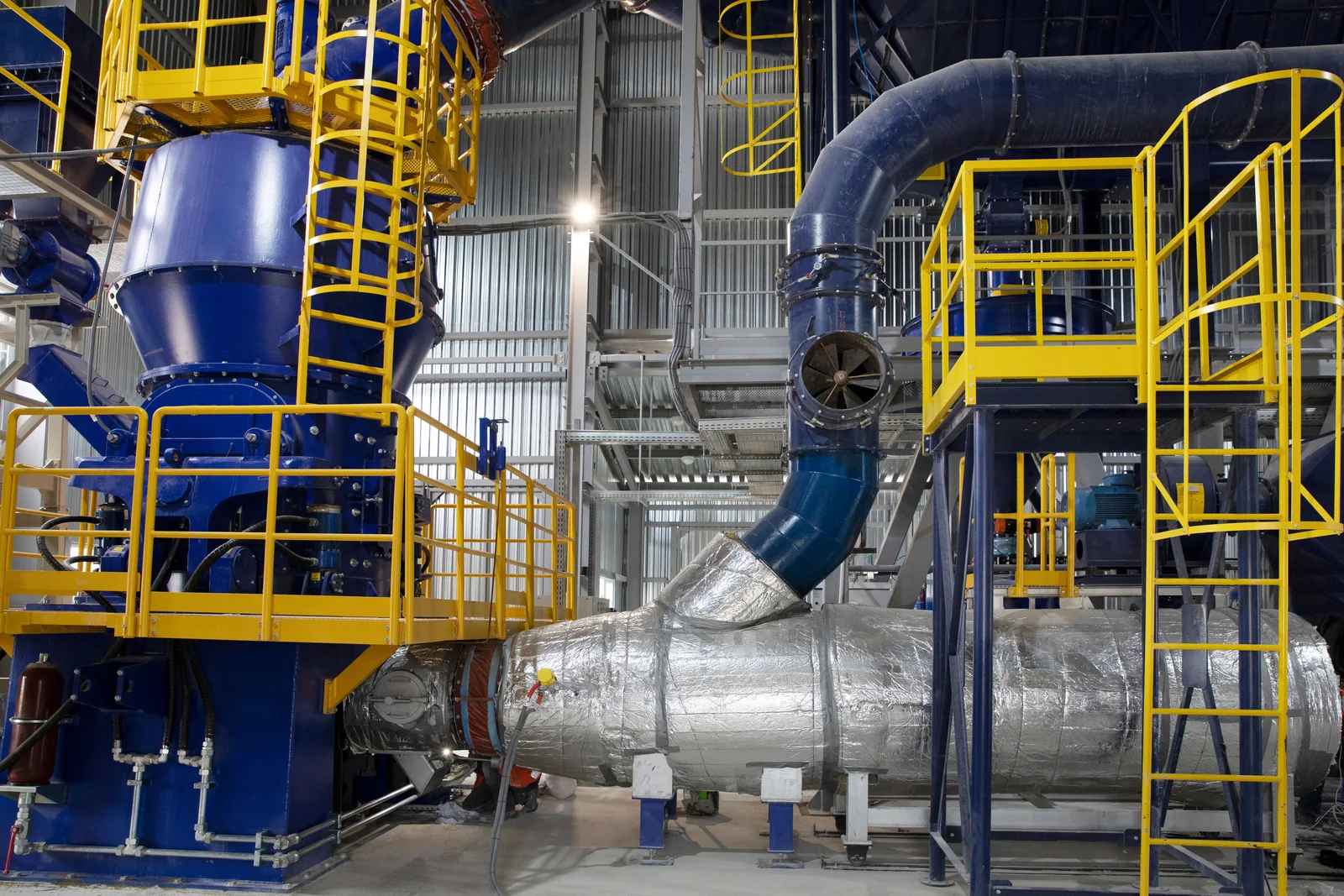 Editorial hero for “KNS-10: Energy-Smart Wastewater Pumping”: infrastructure, people and the project’s core technical intervention, without implying that the project is complete.