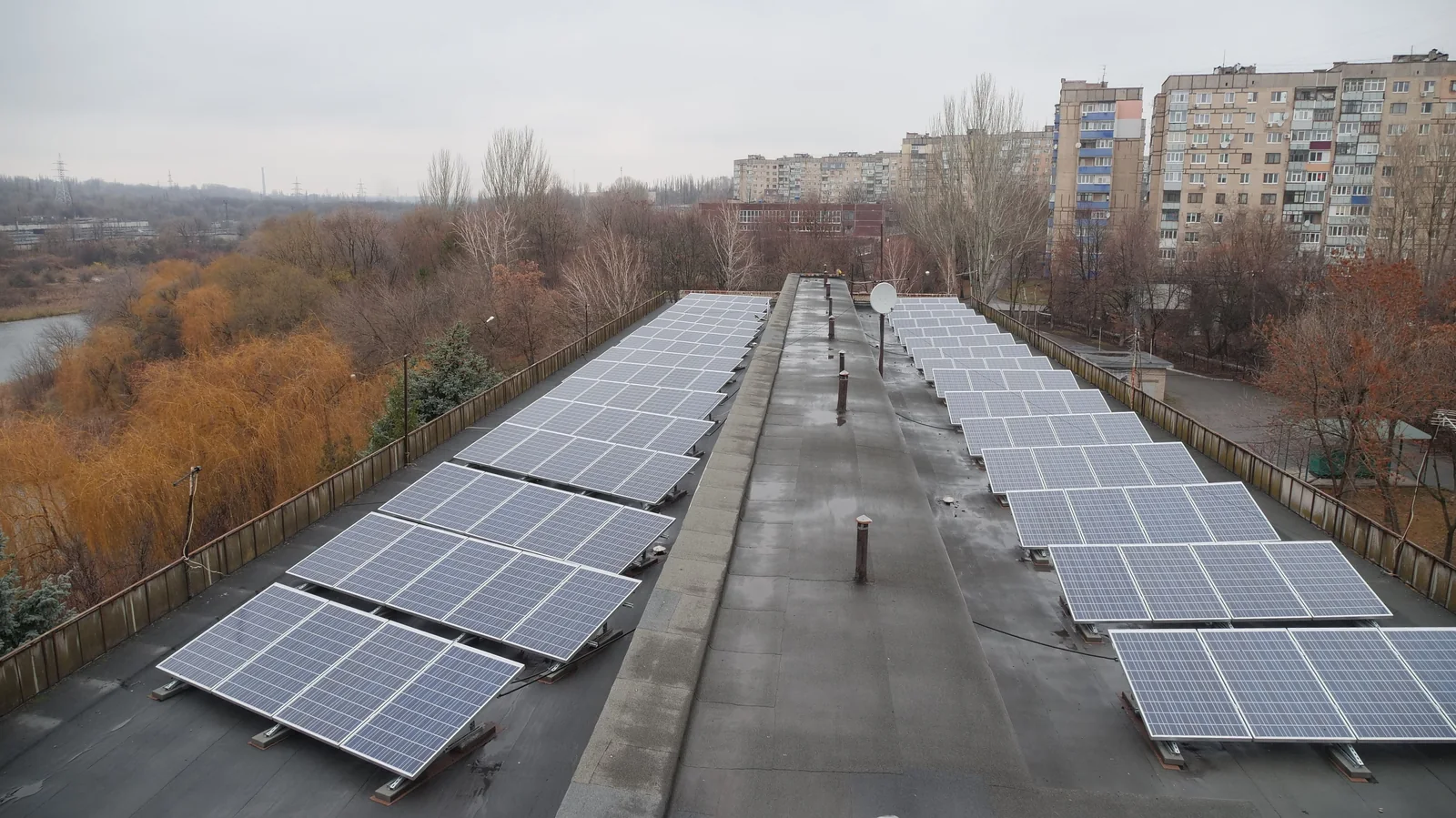 Editorial hero for “An ESCO Portfolio for Local Clean Energy”: infrastructure, people and the project’s core technical intervention, without implying that the project is complete.