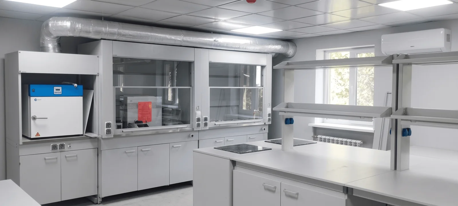 Editorial hero for “Regional Laboratory for Safer Recovery and Circular Materials”: infrastructure, people and the project’s core technical intervention, without implying that the project is complete.